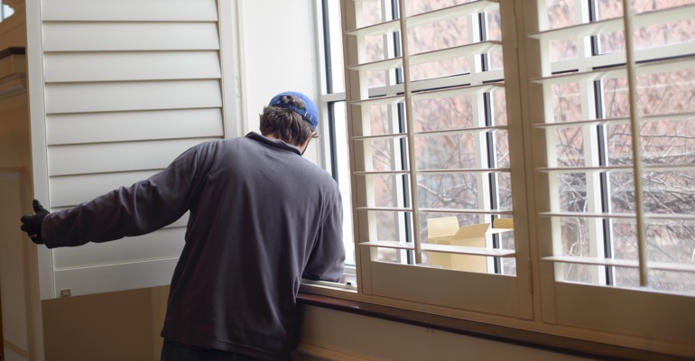 Sunburst Shutters professional installing plantation shutters